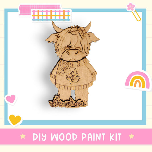 a DIY wood paint kit for creating a wooden character, such as a cow or a bear, with a leaf design. The kit includes a wooden figure and leaves, and the kit is presented in a colorful and playful manner.