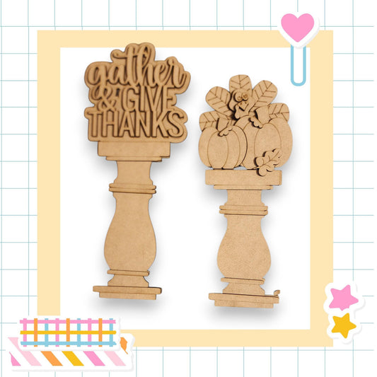 two wooden ornaments, each with a different design, placed on a white background. The ornaments appear to be made of a light-colored material, possibly wood or a similar material. The ornaments are positioned next to each other, creating a visually appealing arrangement.