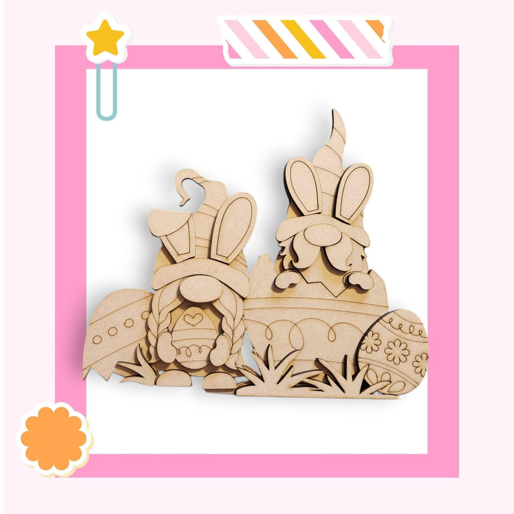 a wooden cutout of two rabbits in a basket
