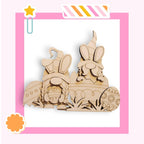 a wooden cutout of two rabbits in a basket