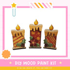 three decorative candles made of wood, each with a unique design and color. The candles are arranged in a row, creating a visually appealing display. The image also includes text that reads "DIY WOOD PAINT KIT" and "IF WE CAN CREATE IT, YOU CAN MAKE IT!" This suggests that the image is promoting a DIY wood paint kit for creating custom wooden candles.