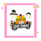 a picture of a thanksgiving card with a turkey in a wagon