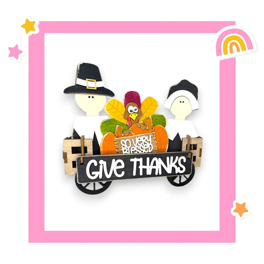 a picture of a thanksgiving card with a turkey in a wagon