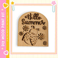 a wooden cutout with a ladybug design and floral elements, along with the text "Hello Summer" written on it.