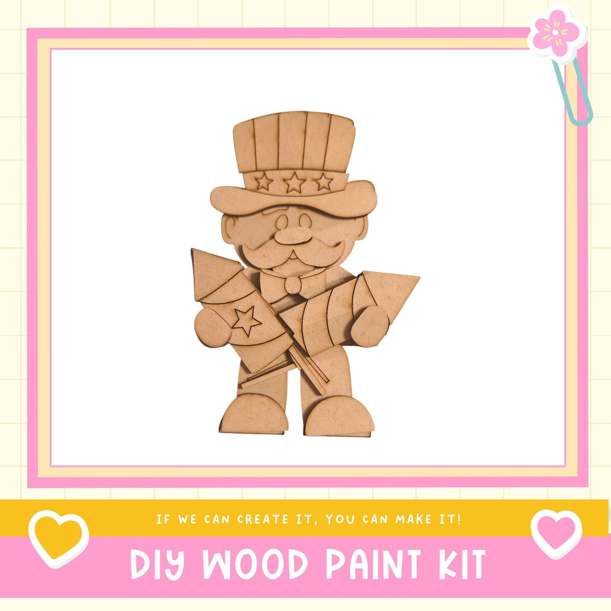 a DIY wood paint kit, with a wooden figure of a man holding a star-shaped object and a heart-shaped object.