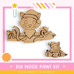 a DIY wood paint kit for creating wooden toys, including a cat and a mouse. The kit appears to be made of wood and is designed for children to engage in a creative and fun activity.