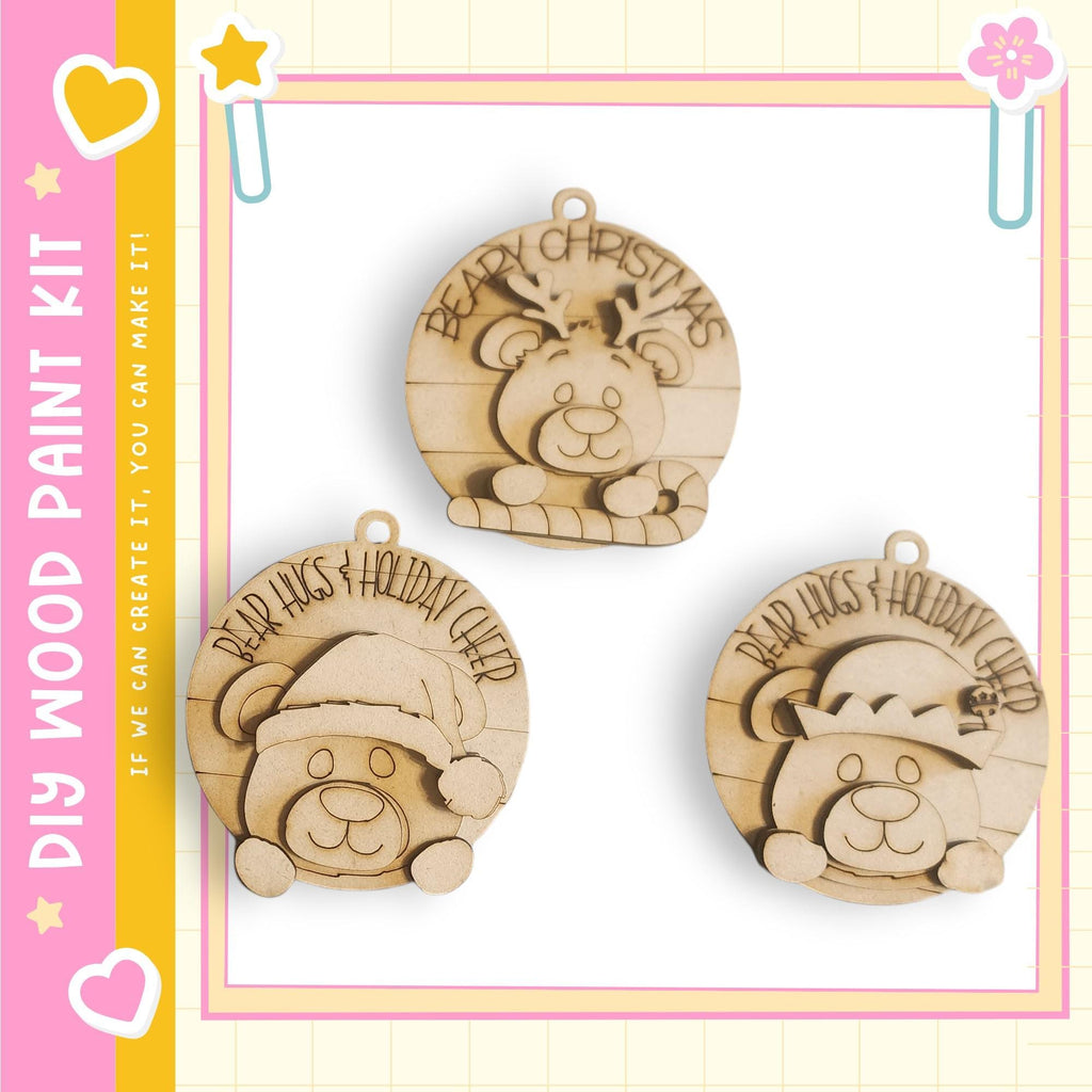 three wooden ornaments with bear faces, each with a different holiday cheer message.