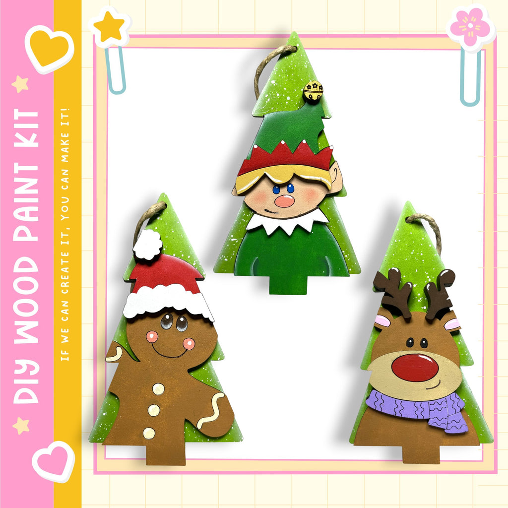 three wooden ornaments with different designs, including a gingerbread man, an elf, and a reindeer.