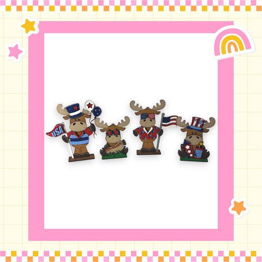 A group of cartoon moose wearing patriotic attire, including American flags and other symbols, are arranged in a row within a pink and yellow checkered border.