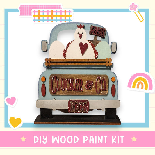 a wooden truck with a decorative chicken figure on the back, along with various colorful stickers and illustrations surrounding the truck.
