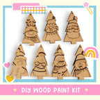 a DIY wood paint kit with various wooden tree ornaments, including Santa Claus, a snowman, and a rainbow.