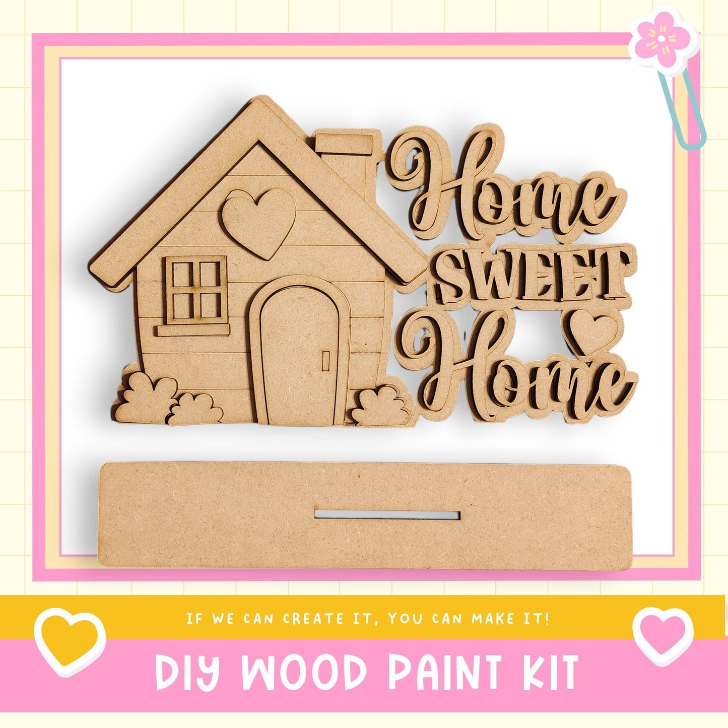 a DIY wood paint kit with a wooden house and the phrase "Home Sweet Home" written on it.