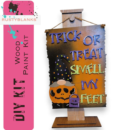 a trick or treat sign with a jack - o - lantern on it