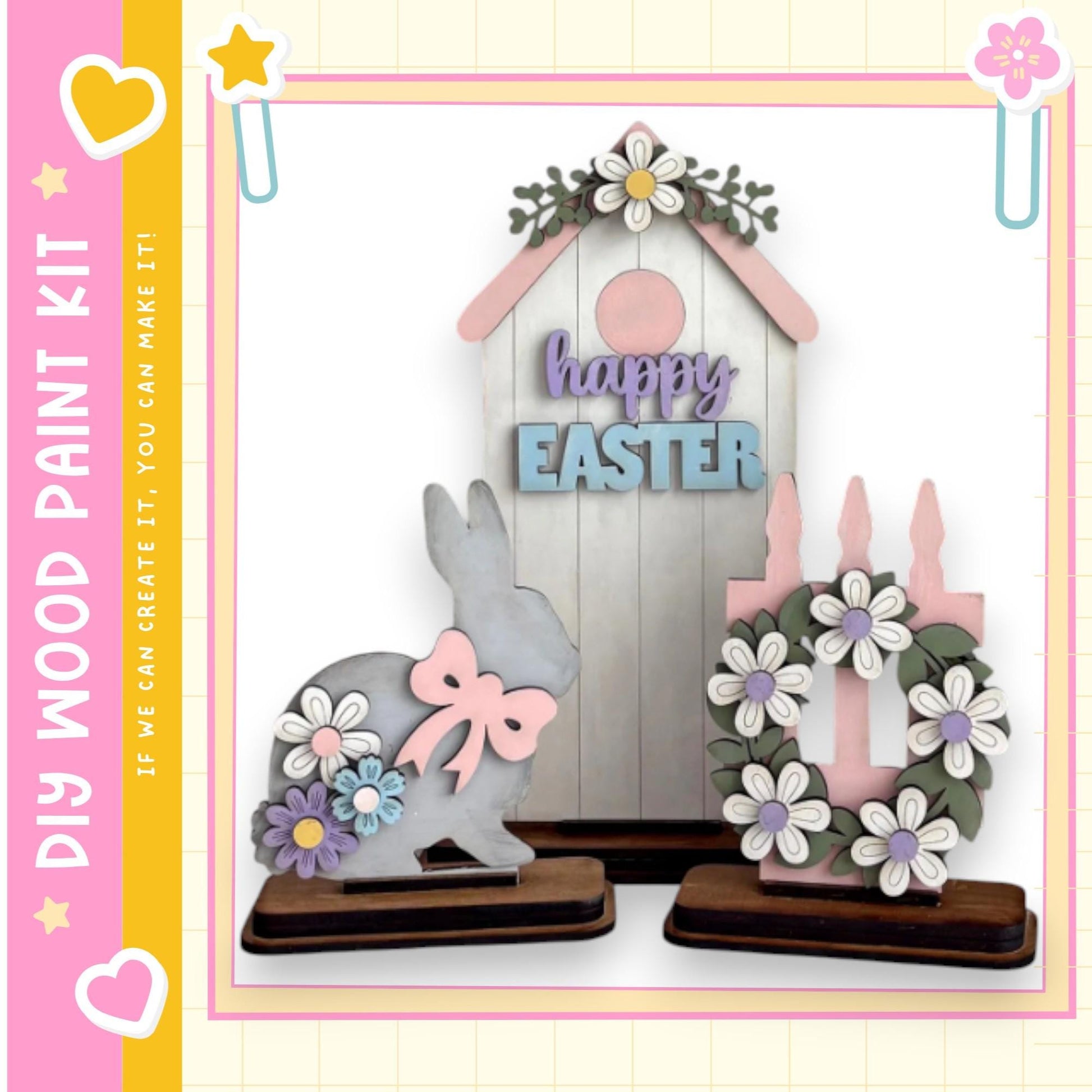 a wooden Easter-themed display with a bunny, a wreath, and a sign that says "happy easter". The bunny is decorated with flowers and a bow, and the wreath is adorned with purple and white flowers. The sign reads "happy easter". The display is set against a pink and yellow background, and there are additional decorative elements such as hearts and stars.