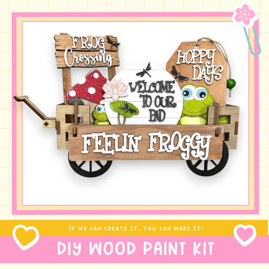 a picture of a wooden cart with a frog on it