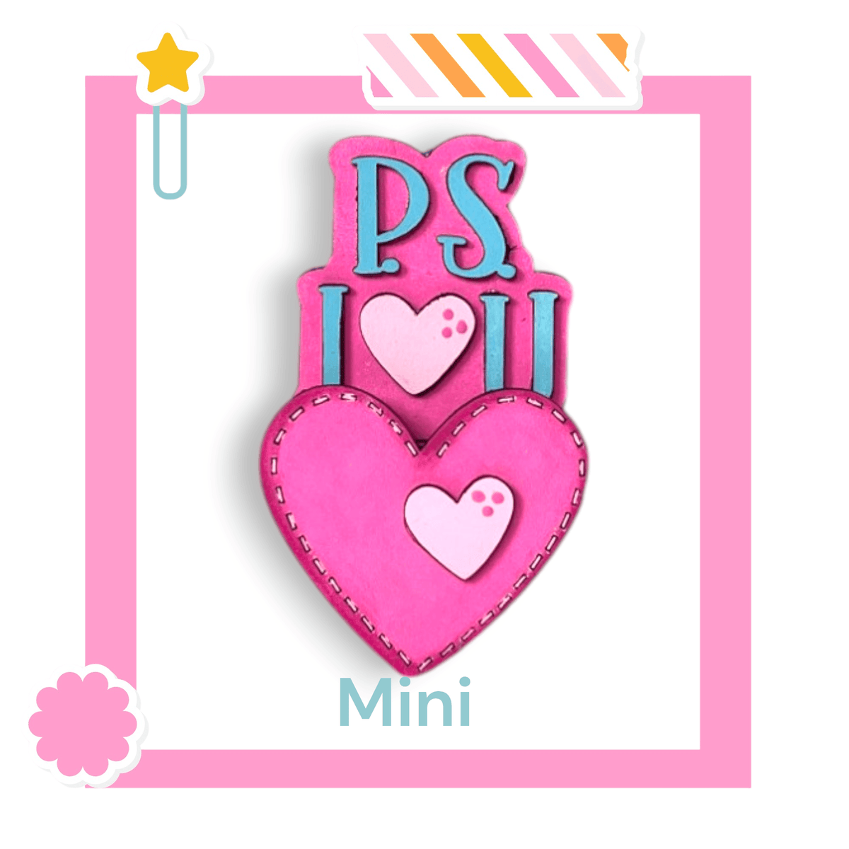 a pink brooch with two hearts on it