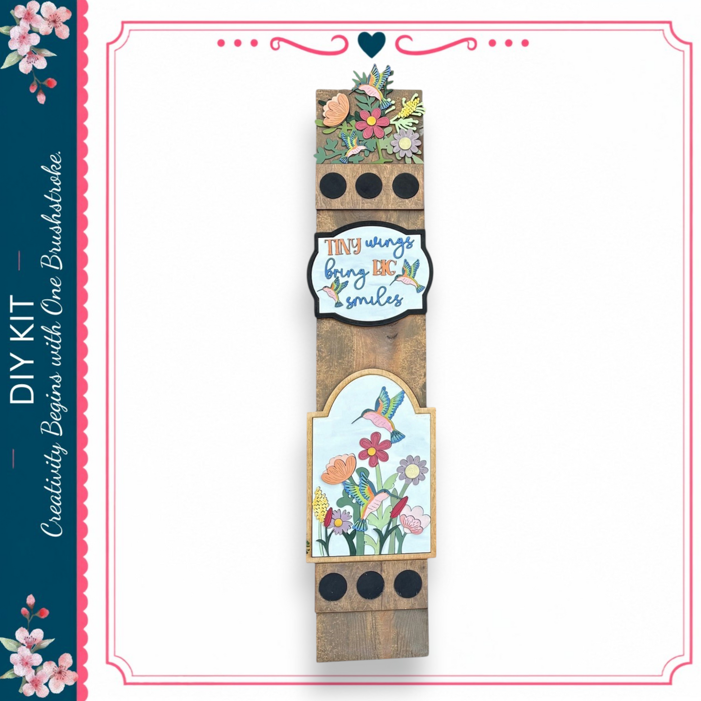 a wooden sign with a floral design and a motivational quote.
