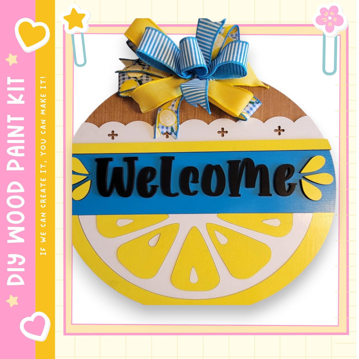 a welcome sign with a lemon slice design and a blue ribbon bow.