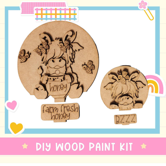 a wooden craft kit with a picture of a cow