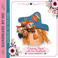 a rustic farmhouse-style scarecrow made of wood, with a plaid hat and a red nose, surrounded by pink and green flowers.