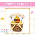 a picture of a duck in a basket