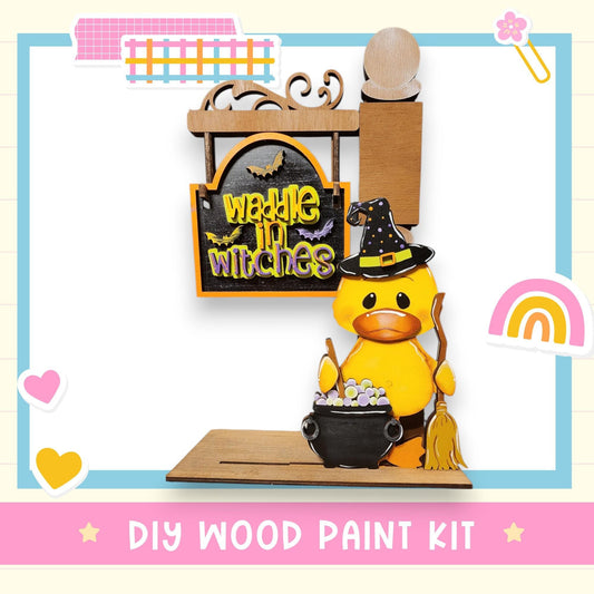 a yellow rubber duck with a witches hat