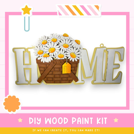 a DIY wood paint kit for creating a wooden sign with a basket of daisies. The kit includes the necessary materials and instructions for creating a personalized wooden sign with a floral design.