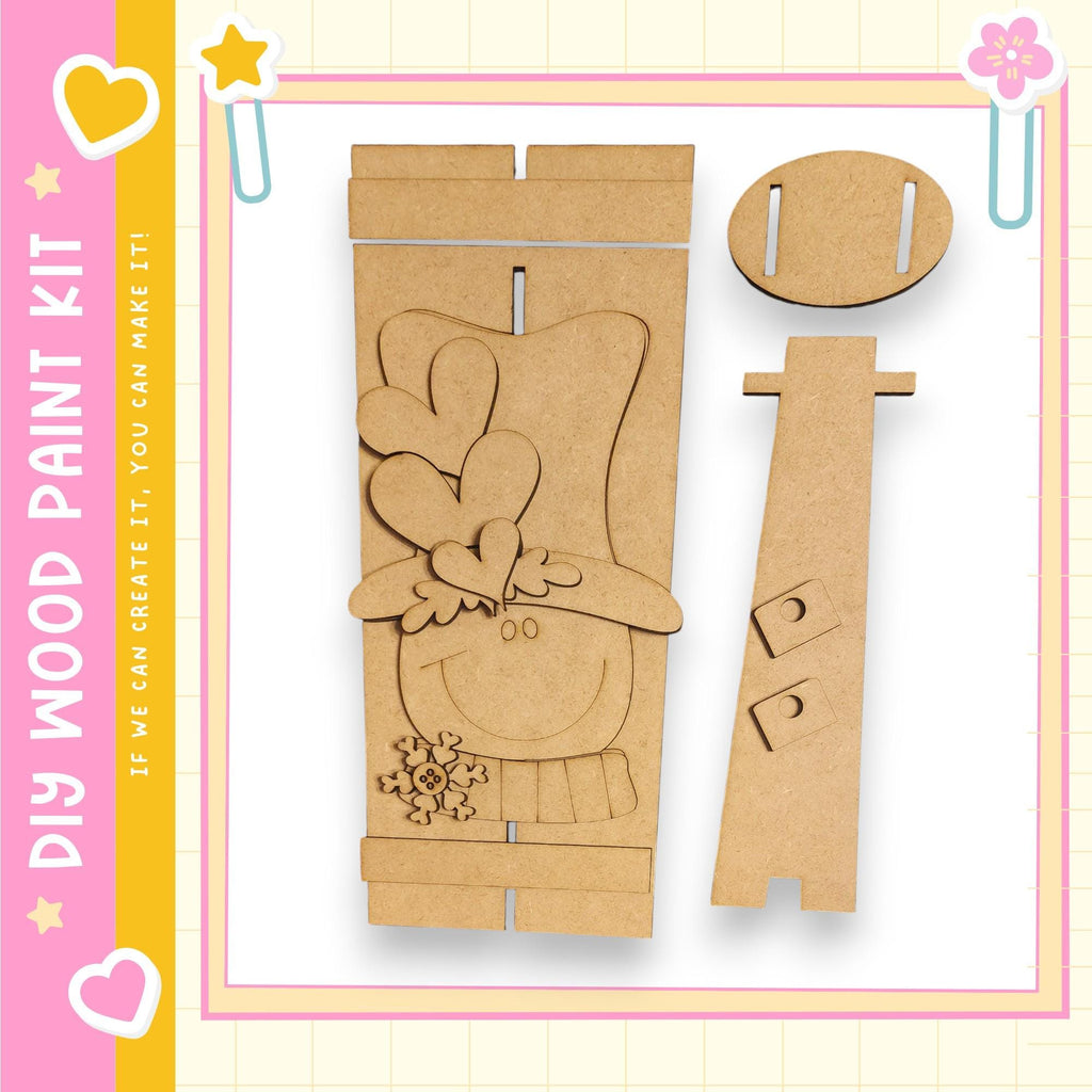 a DIY paint kit for creating a wooden snowman, including a snowman figure and a snowman base.