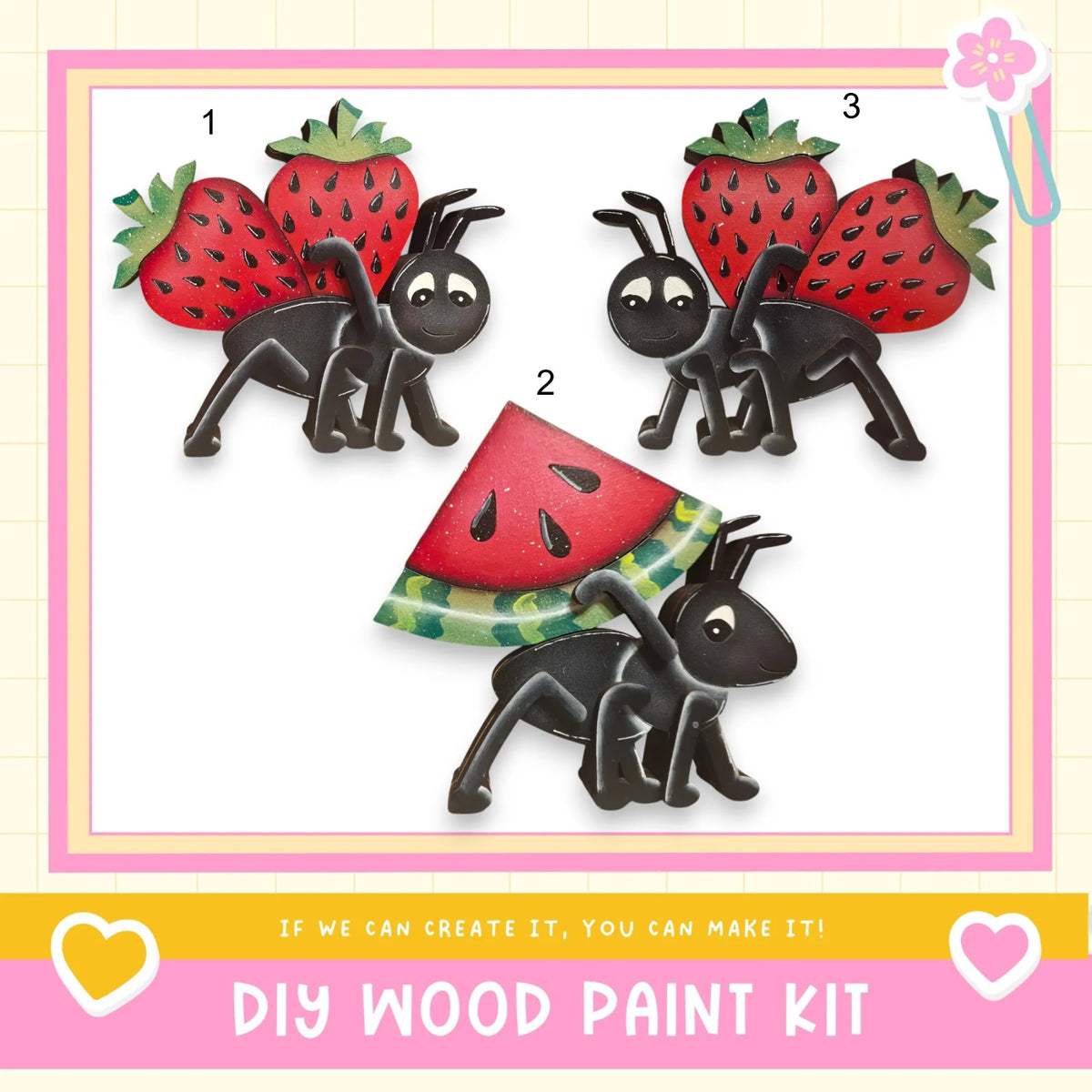 The image is a DIY wood paint kit featuring three black ants carrying strawberries and a watermelon slice.