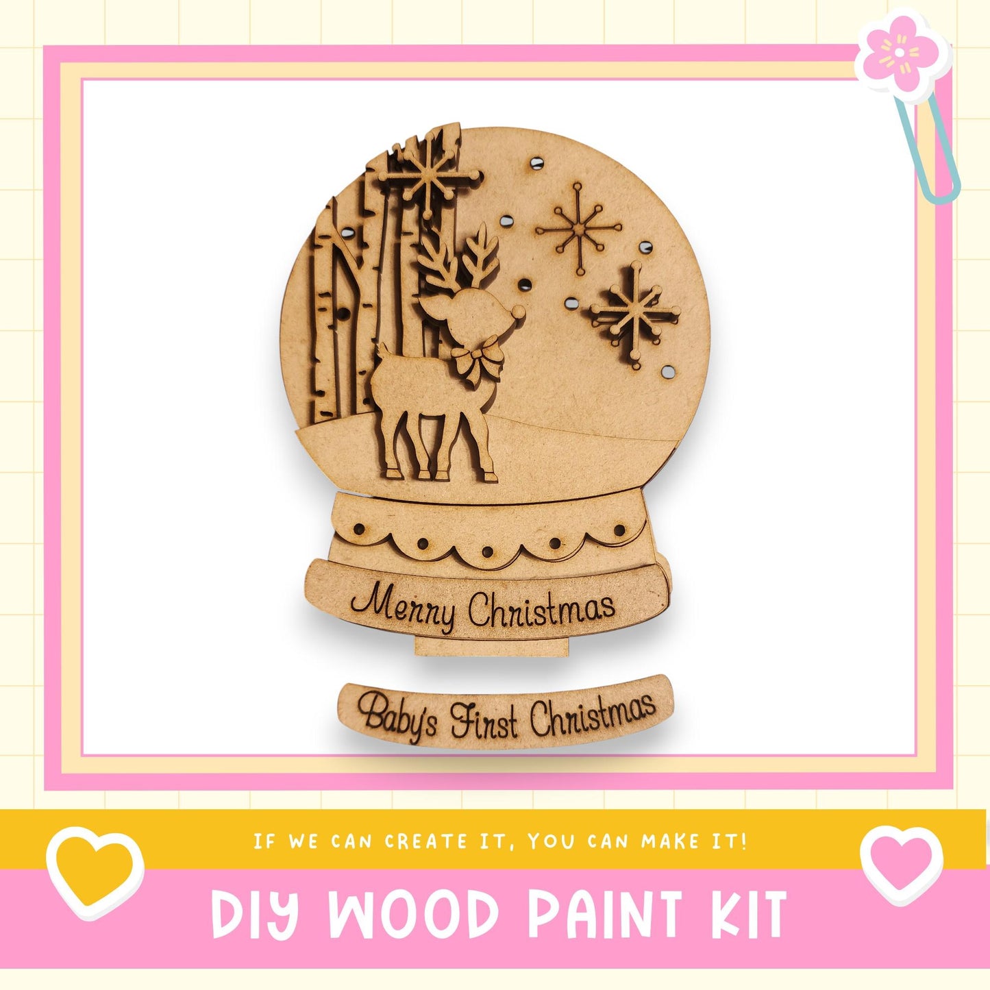 a DIY wood paint kit for creating a wooden snow globe. The kit includes a snow globe with a deer and snowflakes, along with instructions for creating the snow globe.