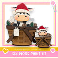 A wooden paint kit featuring two cow-shaped figures, one larger and one smaller, sitting in a basket. The kit appears to be made of wood and is labeled as a DIY wood paint kit.