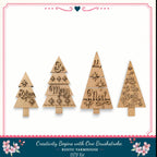 four wooden Christmas tree ornaments with various holiday-themed messages carved into them.