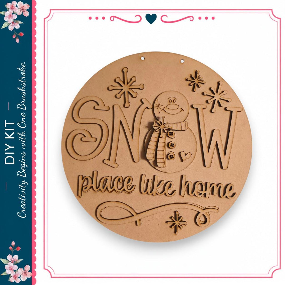 A wooden sign with the text "SNOW place like home" carved into it, featuring a snowman and snowflakes.