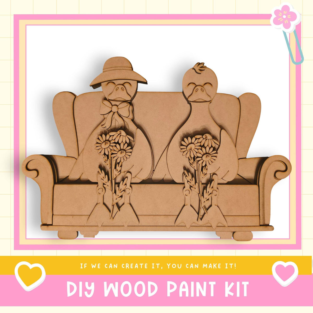 A DIY wood paint kit featuring a wooden sculpture of a man and a woman sitting on a couch, holding flowers.