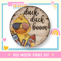 a wooden sign with a duck wearing sunglasses