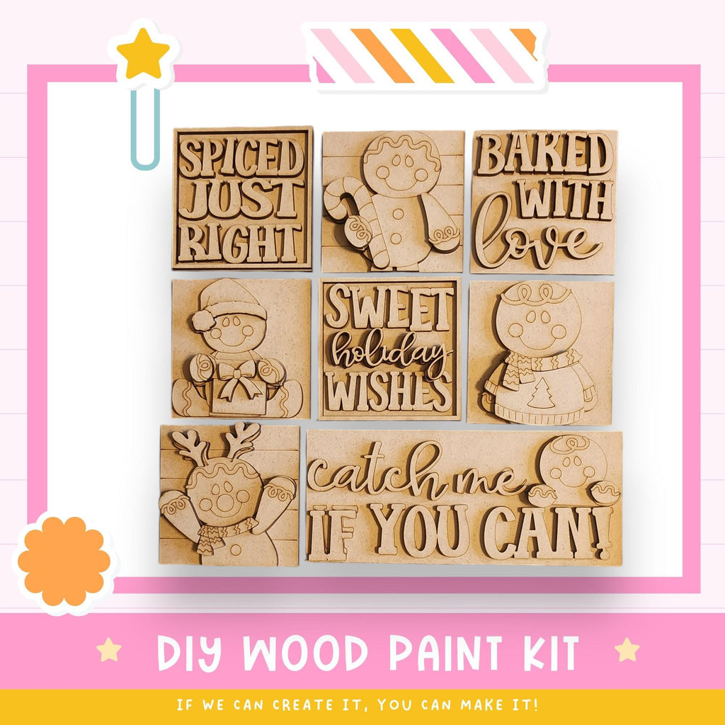 The image is a DIY wood paint kit featuring various wooden shapes and characters, including a star, a gingerbread man, and a cat.