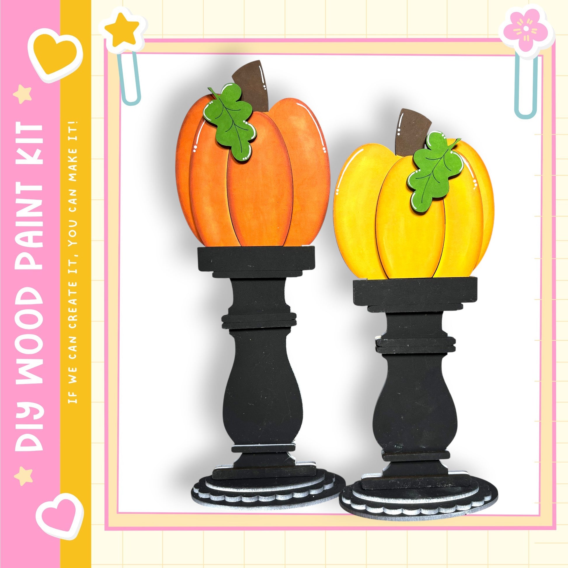 two wooden pumpkin ornaments, each with a green leaf and a brown stem, placed on black pedestals.