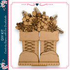 A pair of wooden boots with a floral arrangement on top, set against a white background.