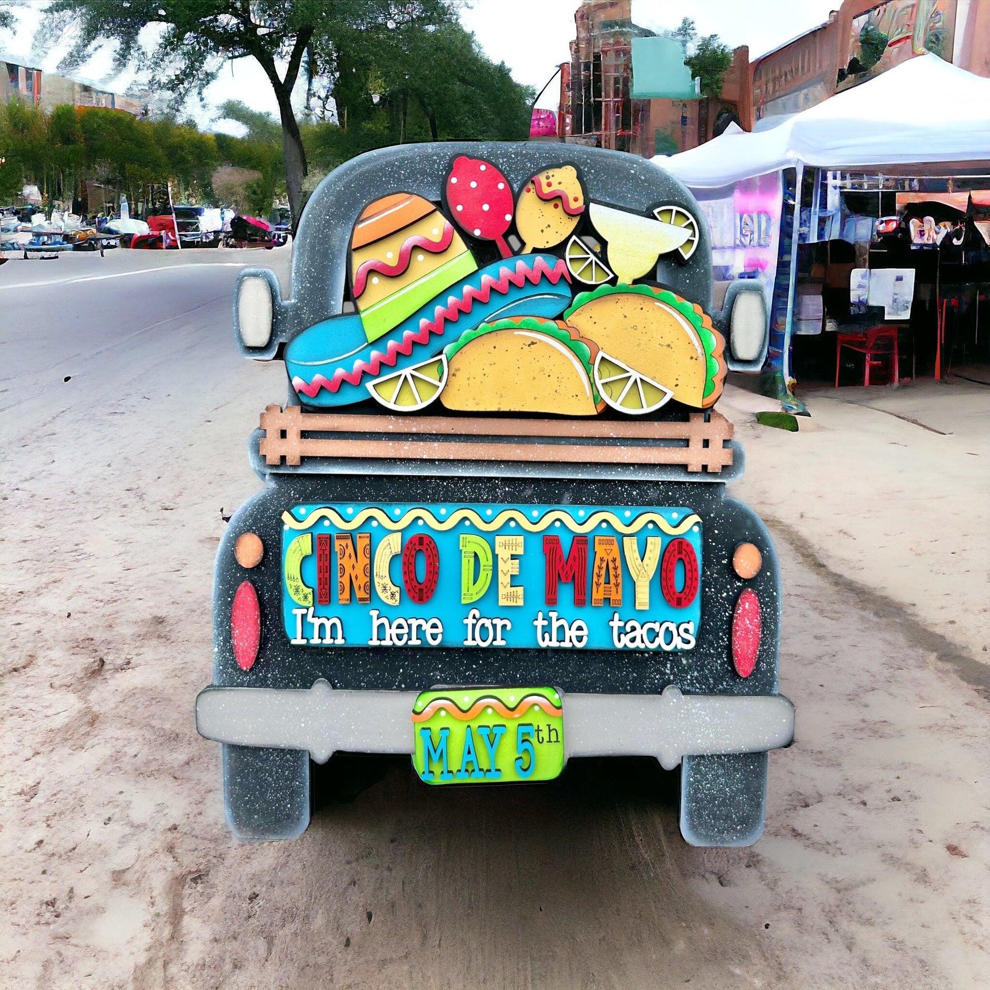 a decorated truck parked on the side of the road