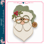 A wooden Santa Claus figure with a green hat and red berries, along with a button on his left ear.