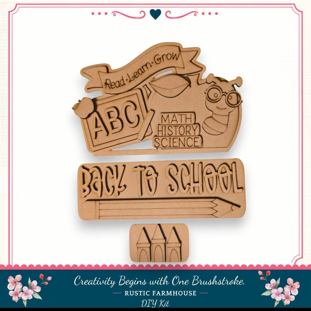 The image is a DIY kit for creating a "Back to School" sign, featuring a wooden cutout with the text "Back to School" and a bee. The kit includes a wooden stick figure and a wooden castle, which are used to create the sign. The kit is designed to encourage creativity and learning, as indicated by the "Read Learn Grow" banner and the "Back to School" message.