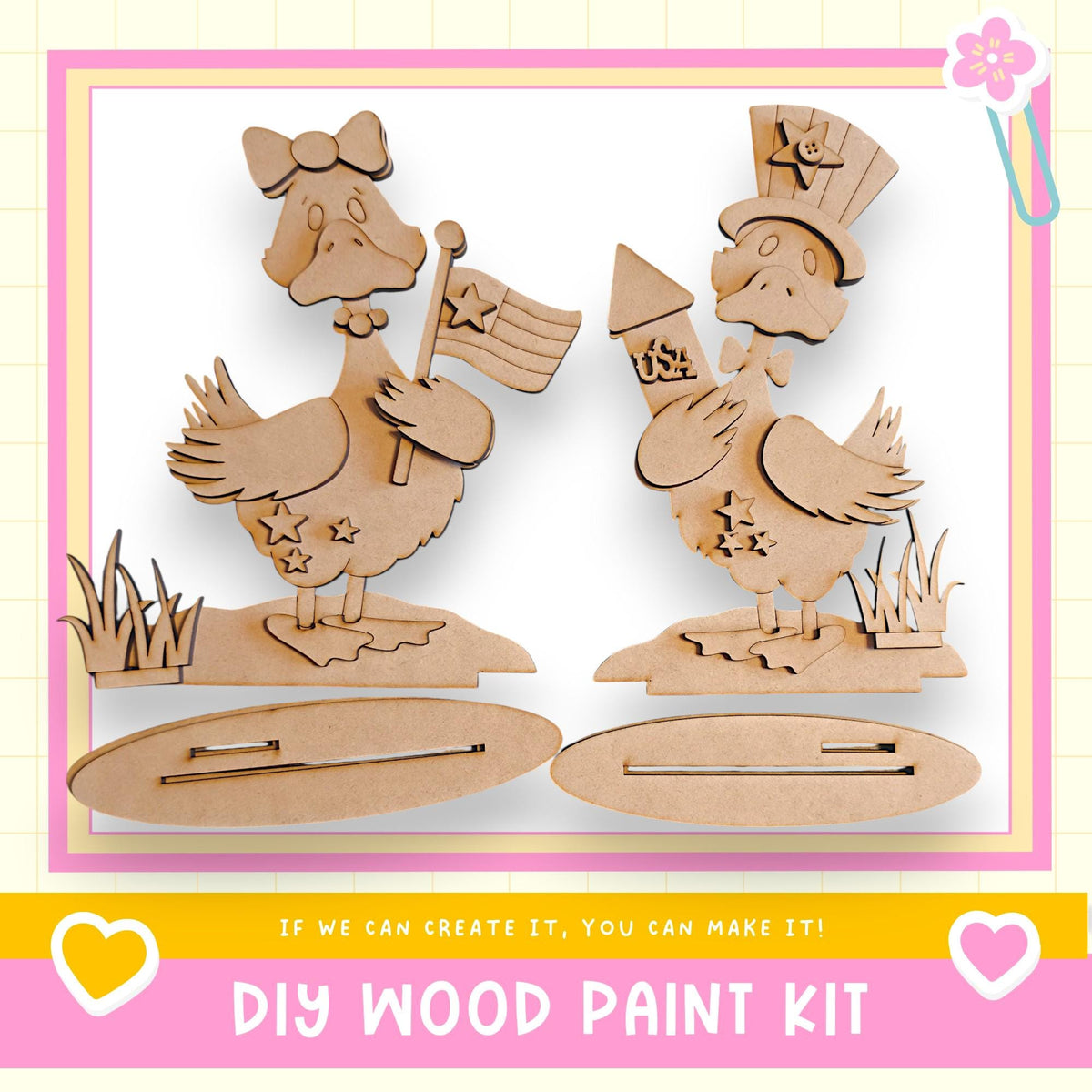 two wooden duck figures, one holding a flag and the other a rocket, standing on a platform. The text below the image reads "DIY WOOD PAINT KIT" and "If we can create it, you can make it!"
