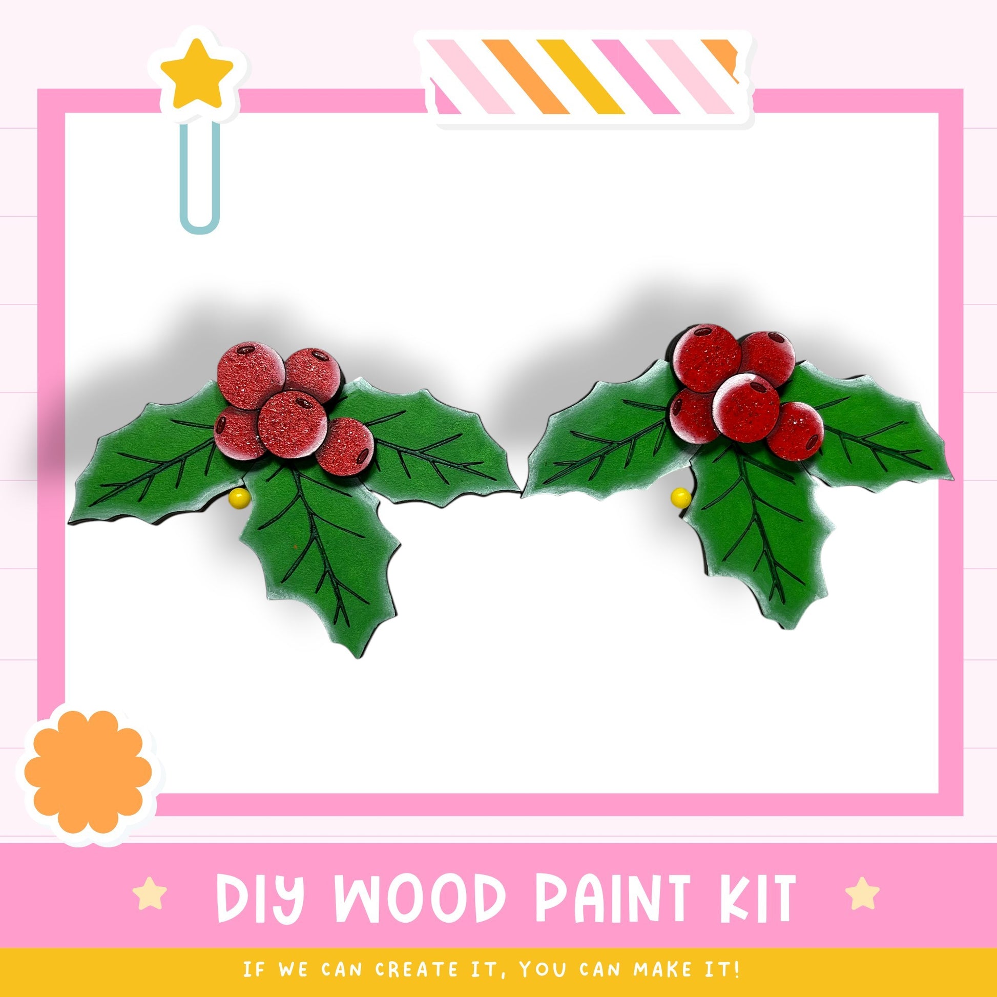 The image is a DIY wood paint kit advertisement, featuring a pink and white background with illustrations of holly leaves and red berries. The text at the bottom of the image encourages viewers to "If we can create it, you can make it!"