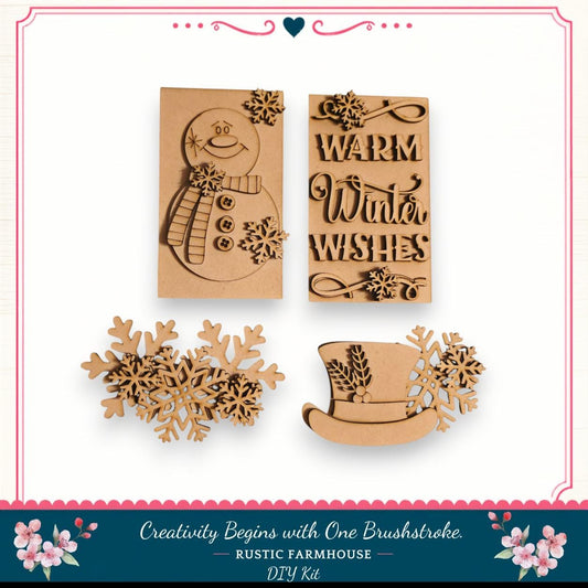 various wooden cutouts and decorations, including a snowman, a hat, and snowflakes, all of which appear to be part of a DIY kit for creating winter-themed decorations.