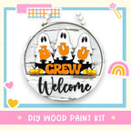 a sign that says crew welcome with three ghostes