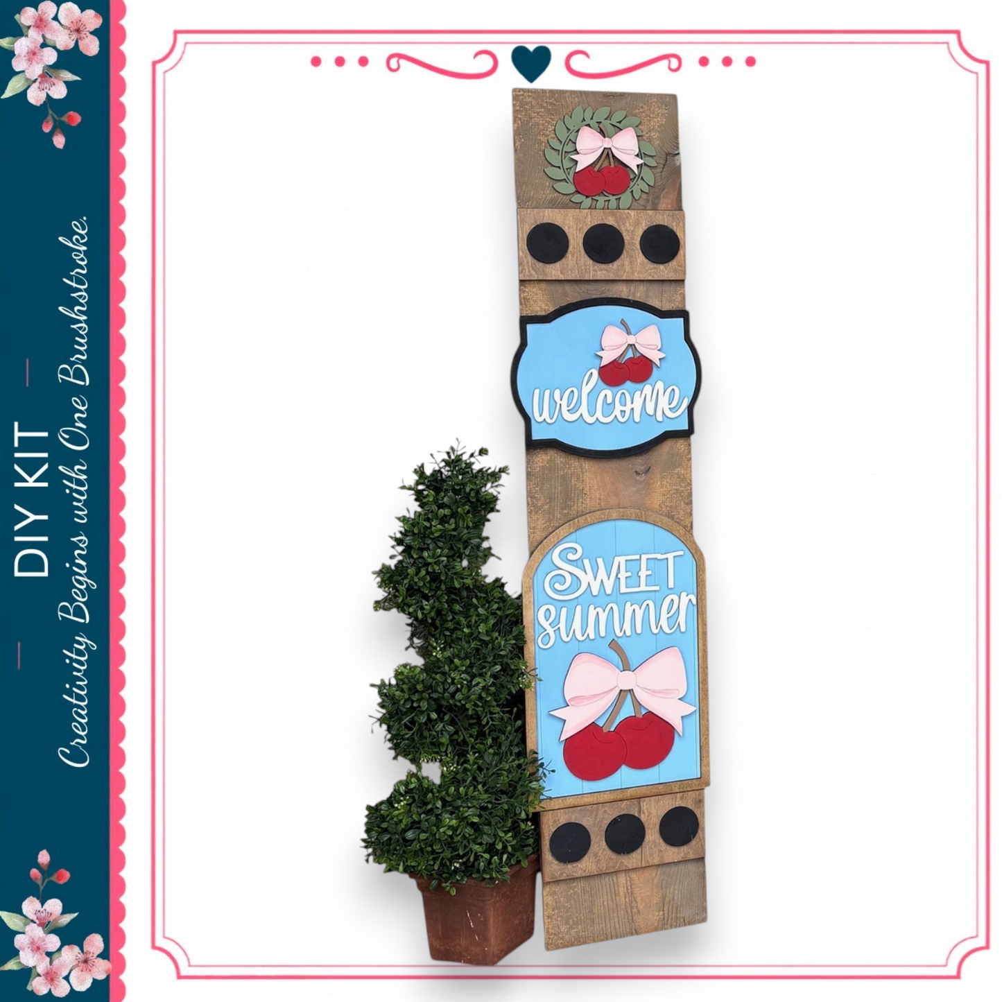 a DIY kit for creating a wooden sign with decorative elements, including a potted plant and a wreath.