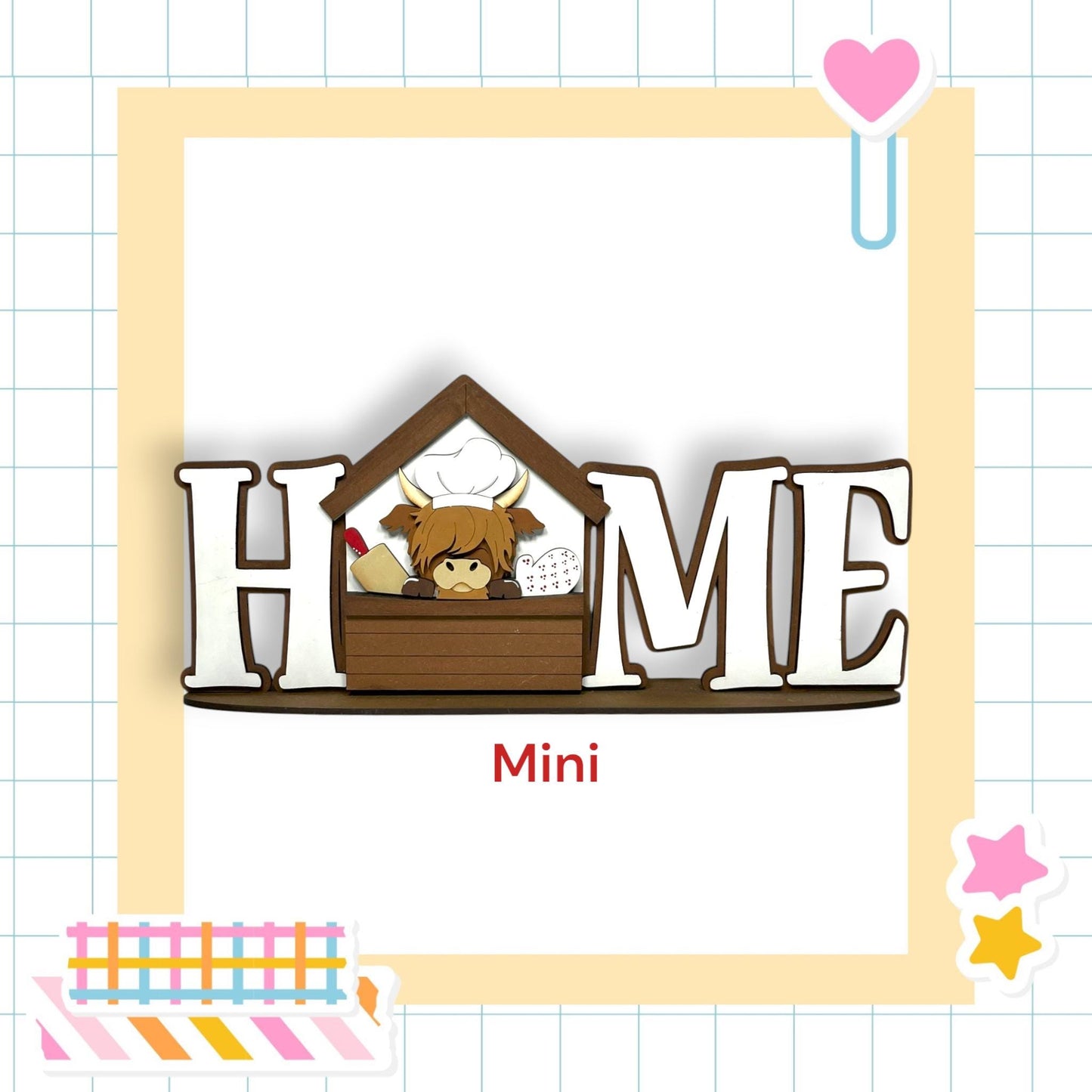 a wooden house with a cow inside, surrounded by a decorative border. The word "HOME" is prominently displayed in the center of the image.