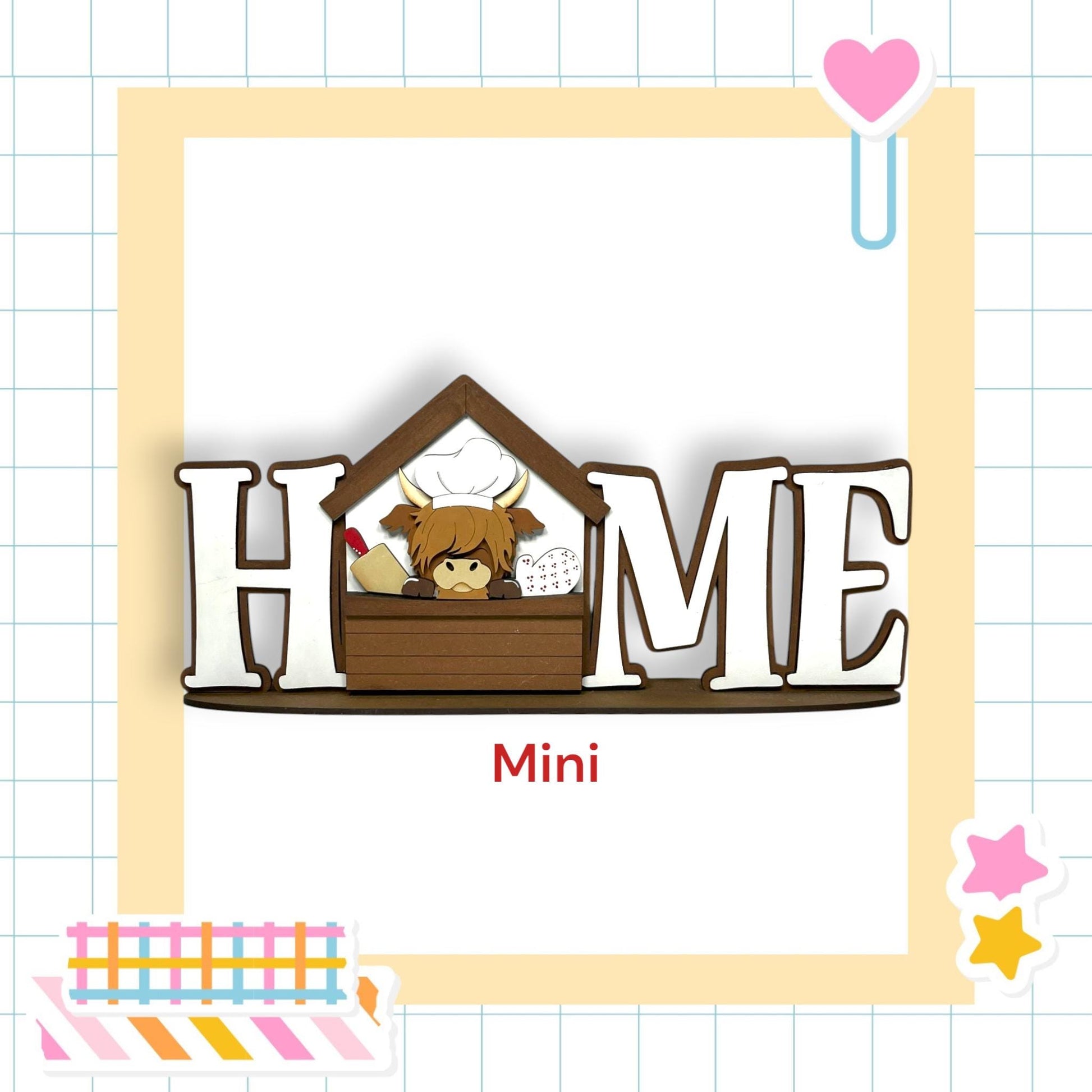 a wooden house with a cow inside, surrounded by a decorative border. The word "HOME" is prominently displayed in the center of the image.