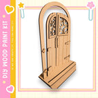 A wooden door with intricate designs, likely a part of a DIY paint kit.