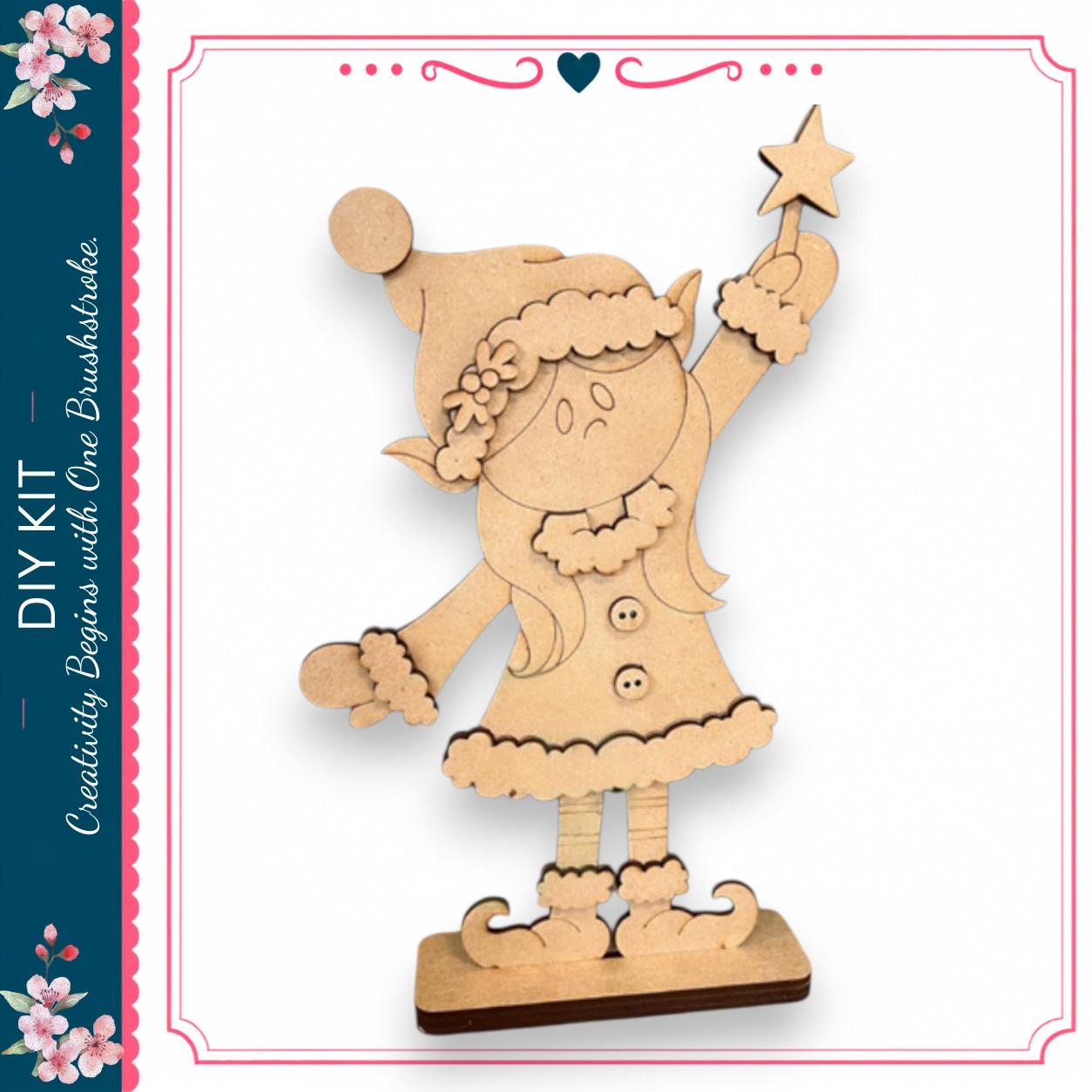 A wooden figure of a girl holding a star, wearing a hat and dress, is depicted in the image.
